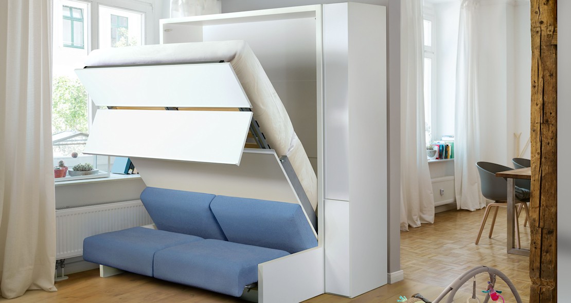 Agencement avec lit escamotable canapé et module chevet